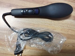 Cepillo alisador eléctrico