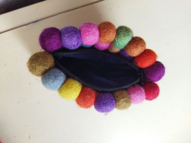 Monedero fieltro 