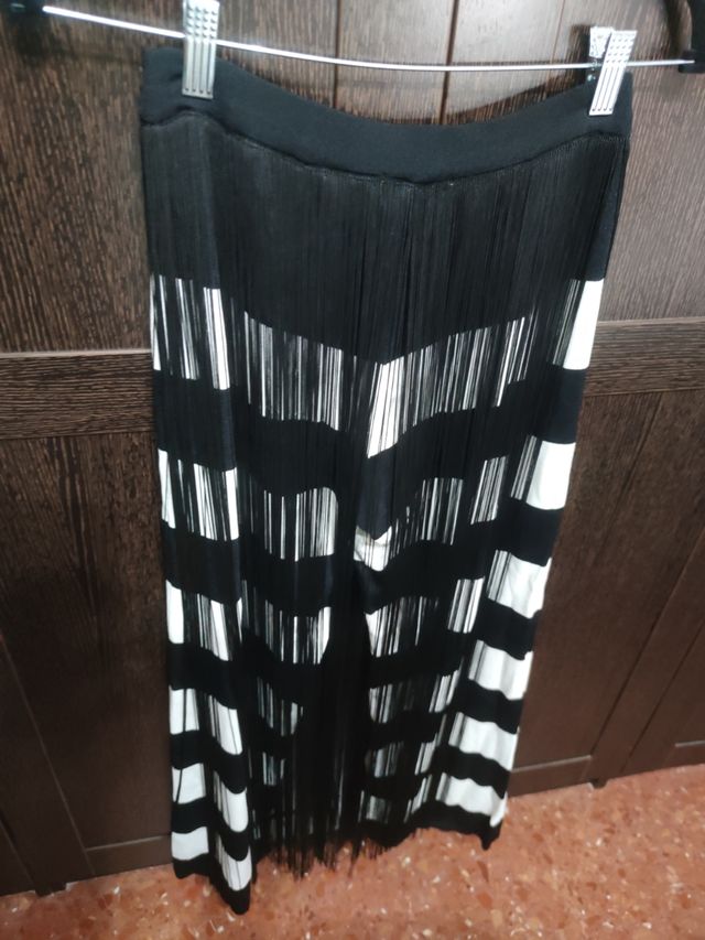 bonito pantalon con flecos de pisonero