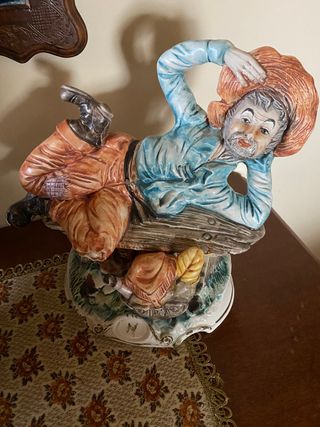 Statua contadino "a riposo"