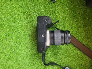 Canon EOS 50 + bolsa Transporte.