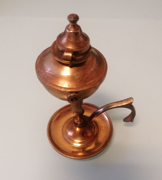 Antigua palmatoria de aceite en bronce