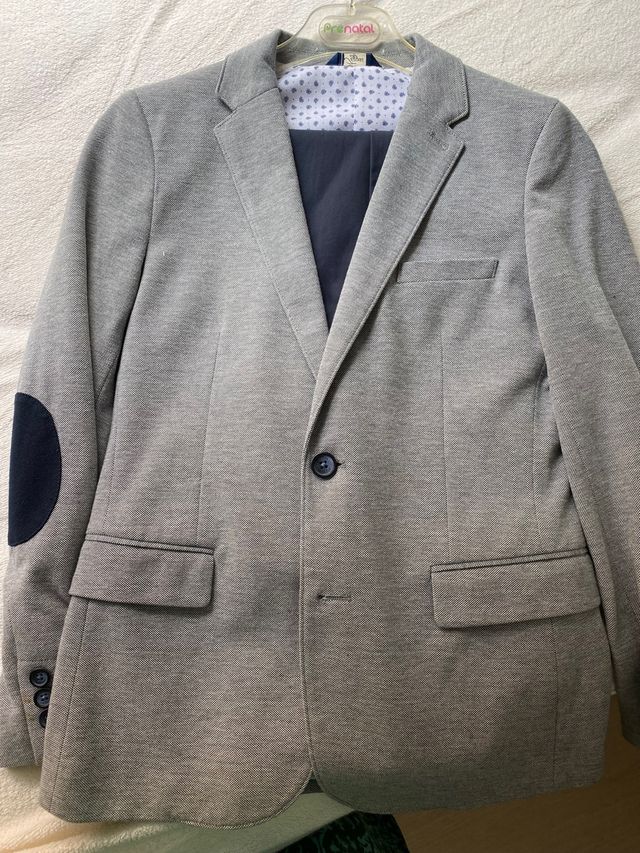 Traje chico de Tizzas