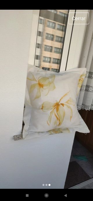 Colcha-edredón + dos cojines.