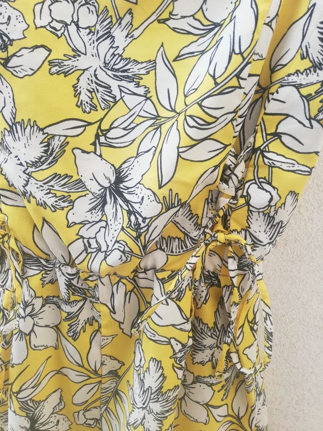 Mono flores amarillo 