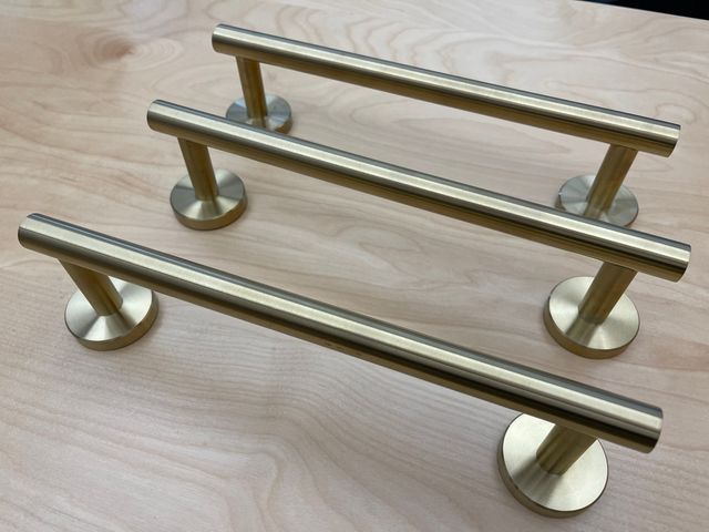 Barras toallero doradas y de decoración 