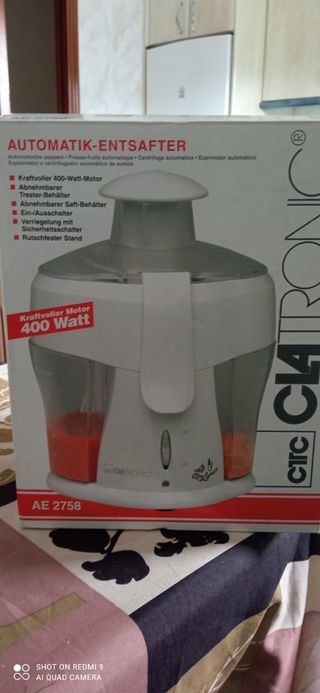 exprimidor automatico