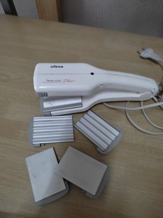 plancha de pelo 10€