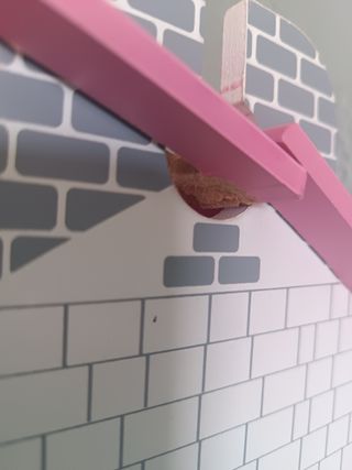 Casa de muñecas de madera