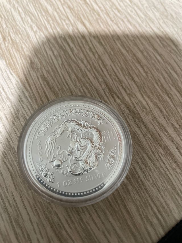 Monedas plata Elizabeth II y One dolar australia