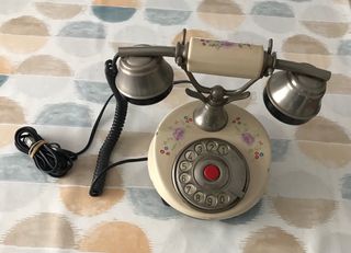 Teléfono antiguo de porcelana decorada
