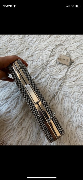 Bolso clutch plateado Sfera