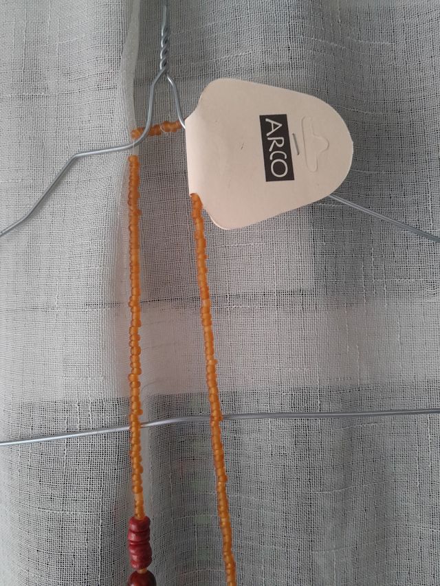 collana donna lunga con perline arancio e medaglia
