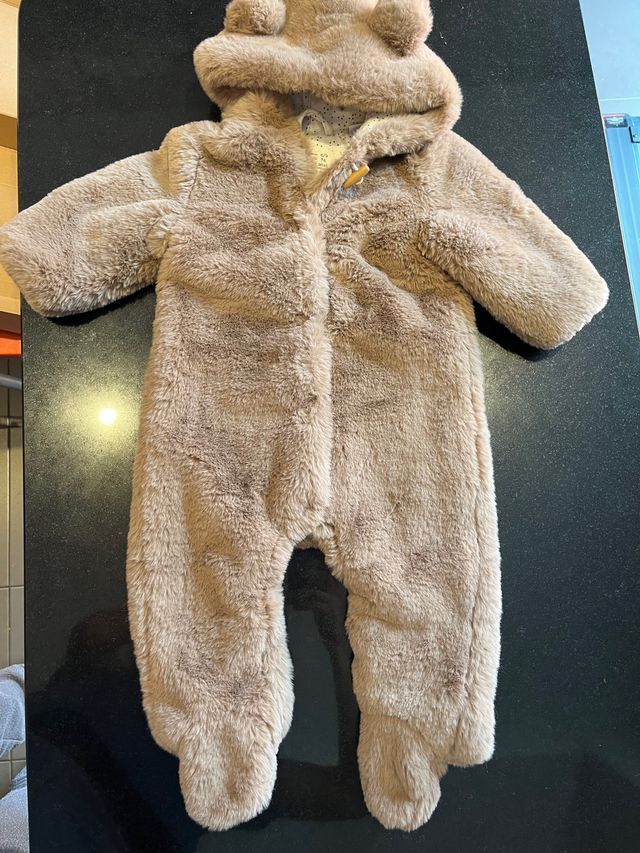 Mono de bebé de 6 a 9 meses 