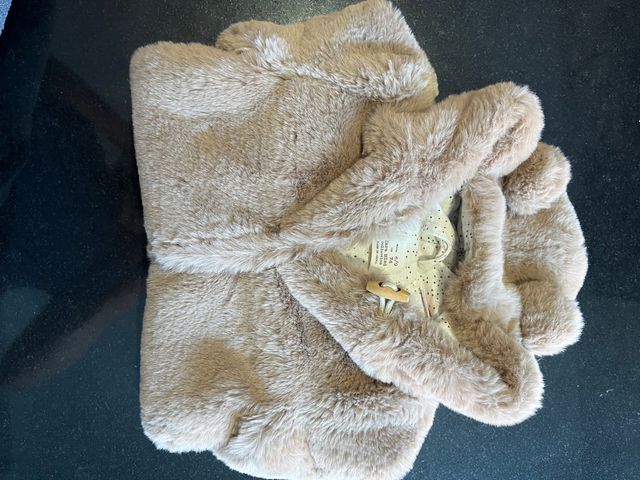 Mono de bebé de 6 a 9 meses 