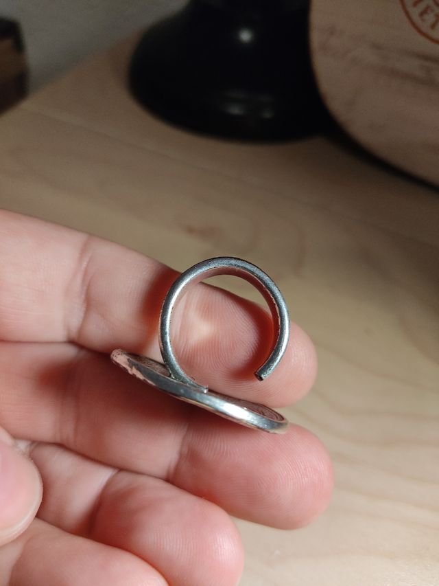 Anillo con forma de moneda