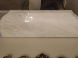 Conjunto recibidor bronce y mármol.