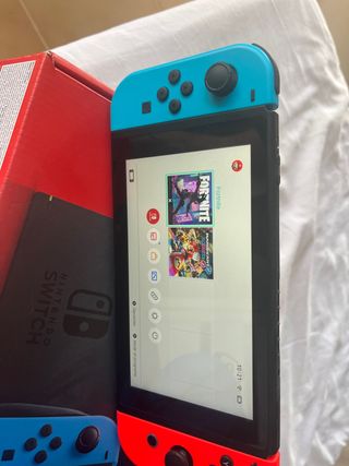 Nintendo shwitch  con auriculares y mando extra