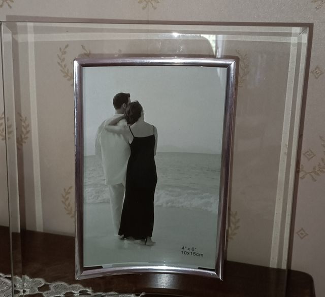 Portafoto in vetro e acciaio