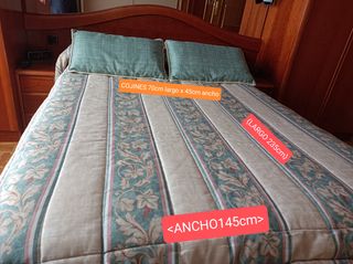 Edredón cama de 135cm tonos beige, verde y marrón.