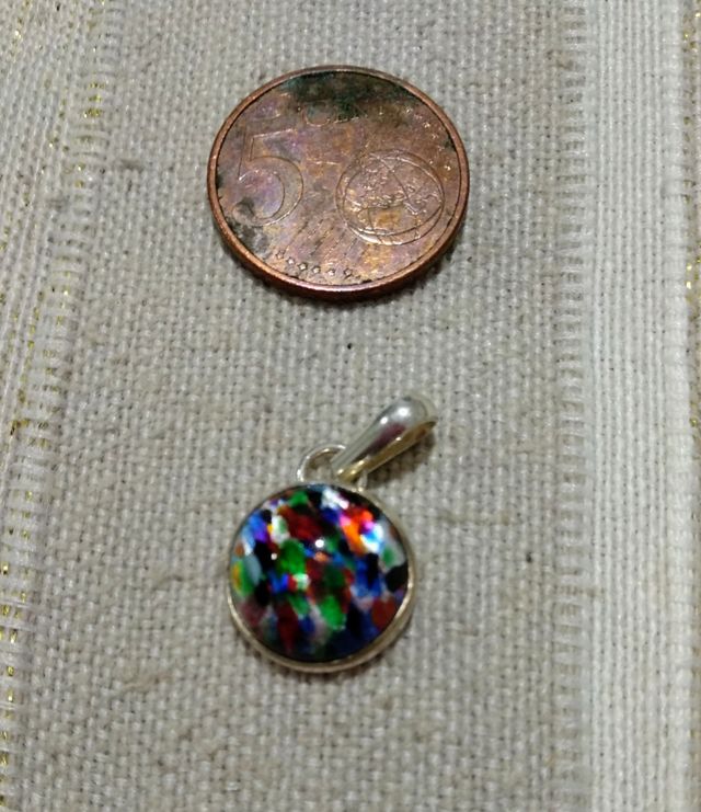 Conjunto de pendientes y colgante