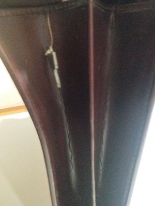 Maletín ejecutivo de piel marron.