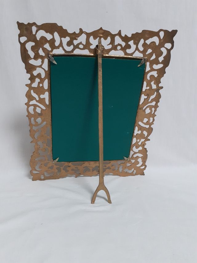 Elegante marco portafotos bronce med. total  27x33