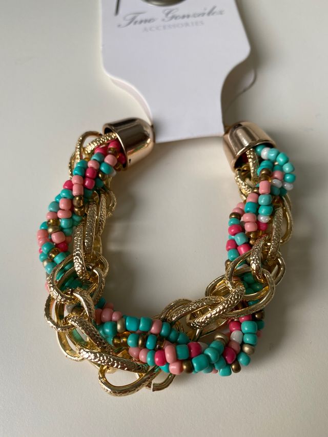 Pulsera dorada con abalorios de colores
