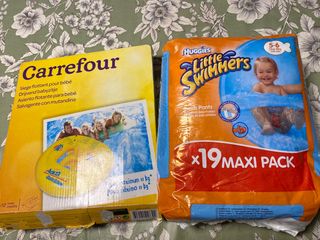 Pañales de agua + flotador con asiento nuevos