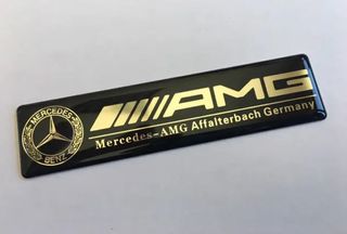 EMBLEMA AMG NEGRO SILICONA MERCEDES LOGO INTERIOR
