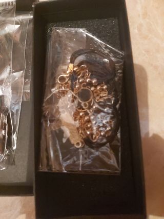 reloj y pulseras de mujer