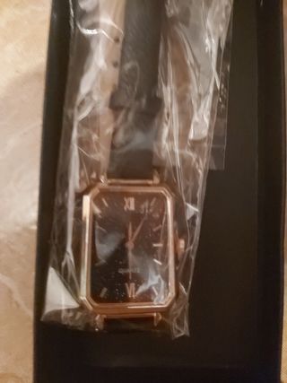reloj y pulseras de mujer