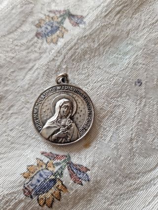 moneda de plata mide igual que una moneda de dos