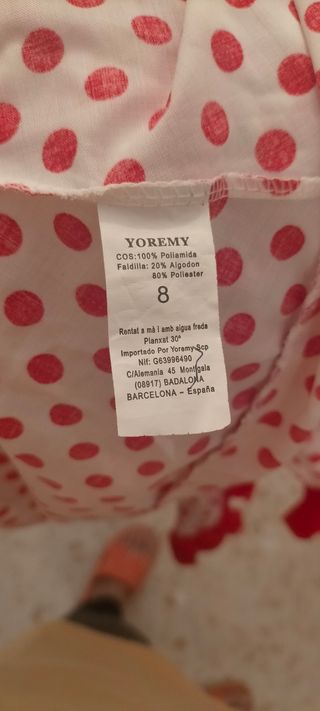 traje flamenca verde y lunares blancos.