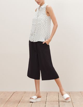 Blusa blanca lunares negros Stradivarius talla L