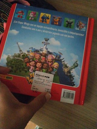libro con puzzles. super wings