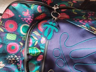 mochila y neceser grande marca totto