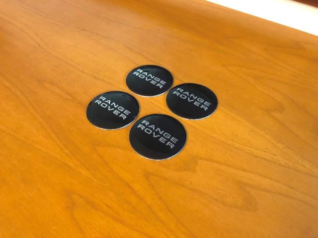 4 lenti adesive Range Rover nero 56mm