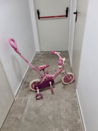 Bicicleta para niña con barra de aprendizaje