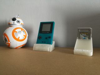 soporte Game boy color y base para juegos