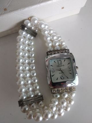 reloj de perlitas