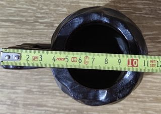 Antigua jarra de madera maciza tallada