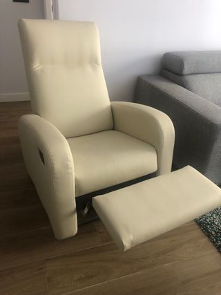 Butaca tapizada en piel