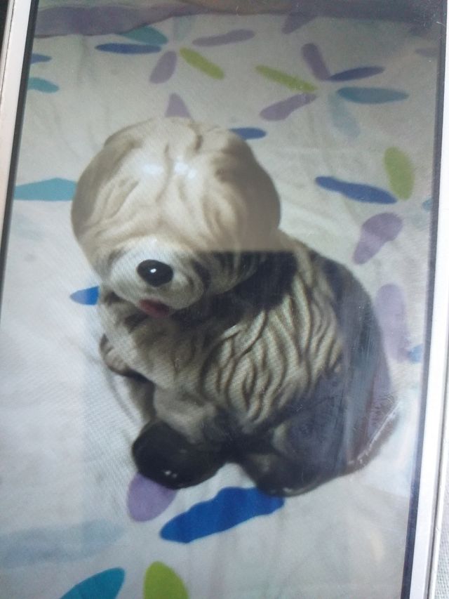 perrito de porcelana .de adorno grandecito