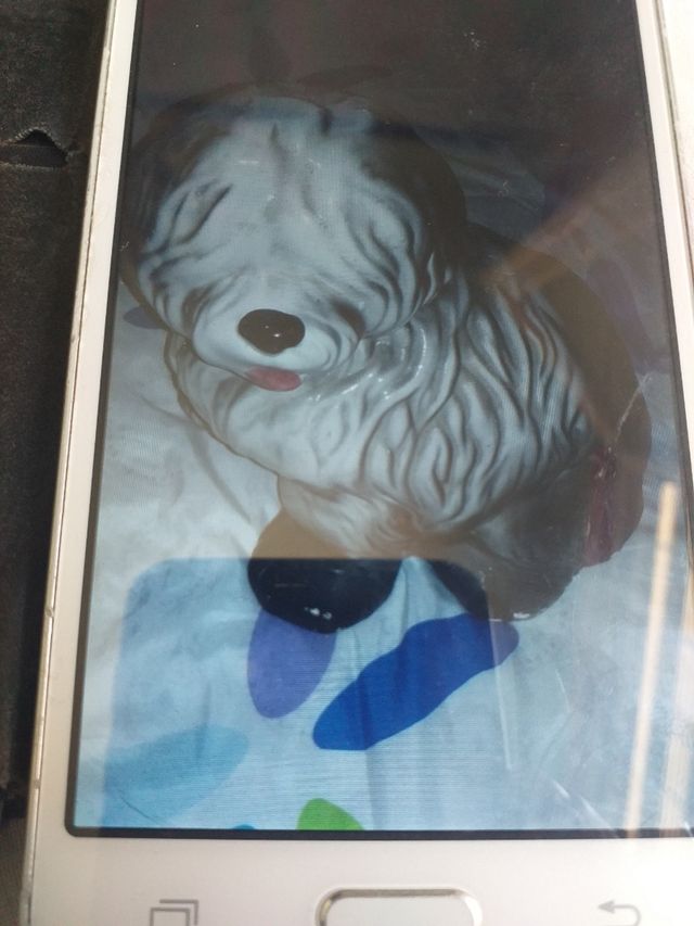 perrito de porcelana .de adorno grandecito