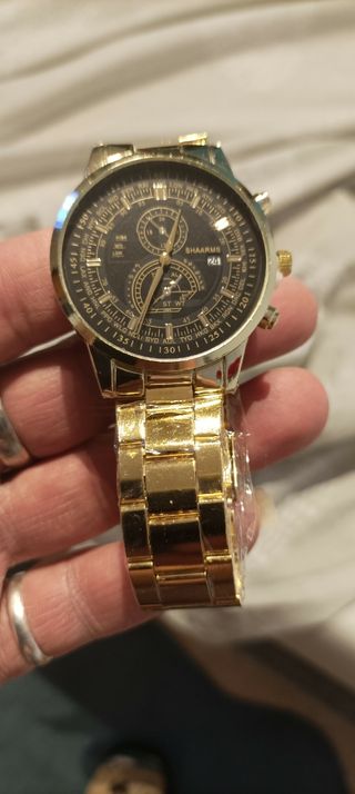 reloj y pulsera