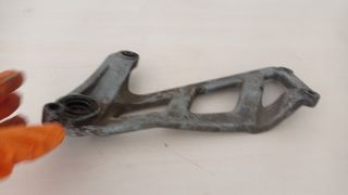 -Honda Scoopy SH 50cc. Soporte tubo de escape