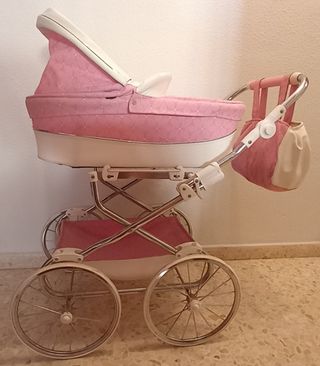 Carrito reborn color rosa y blanco