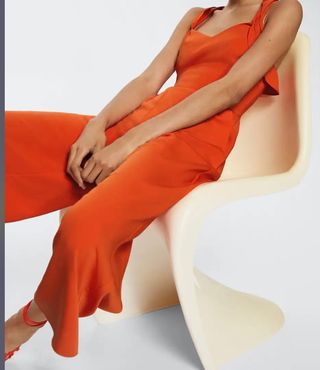 Monos tirantes cruzados. Naranja. Mango.