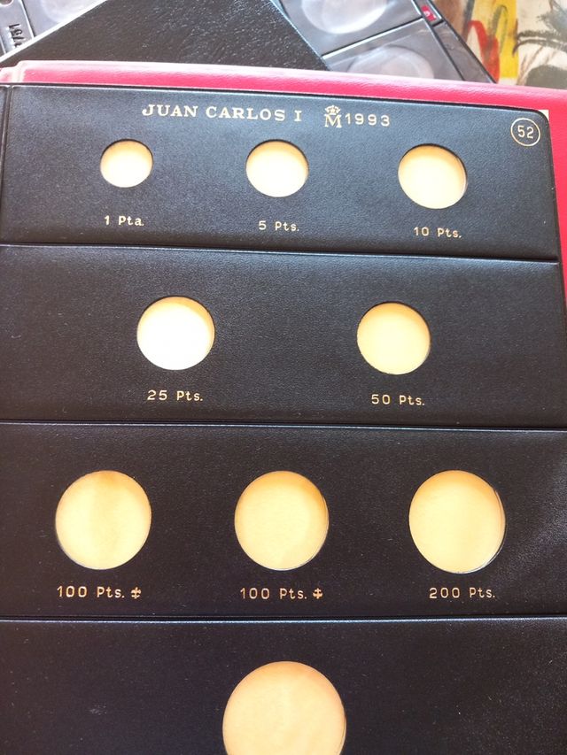 álbum de moneda y hojas